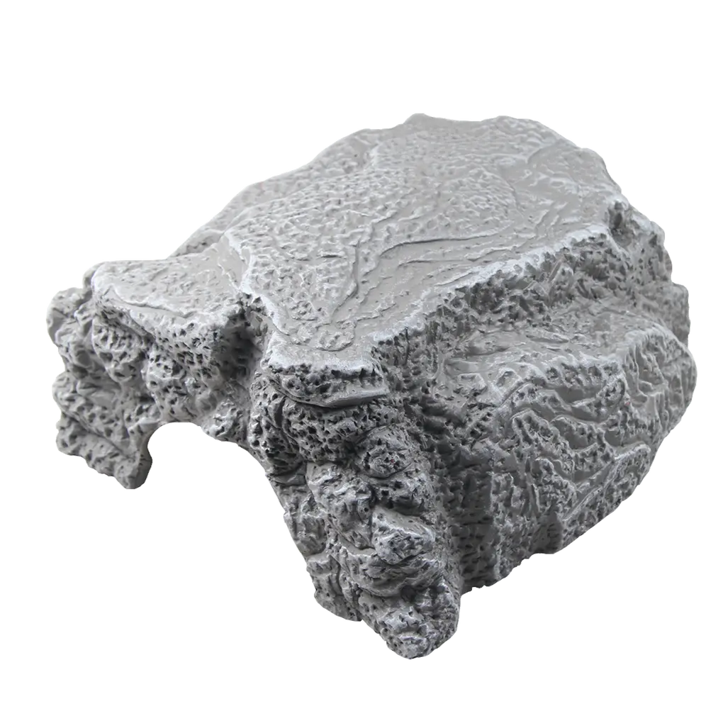 Individuele inrichting van het terrarium: grot in steenlook als schuilplaats voor de terrariumbewoners